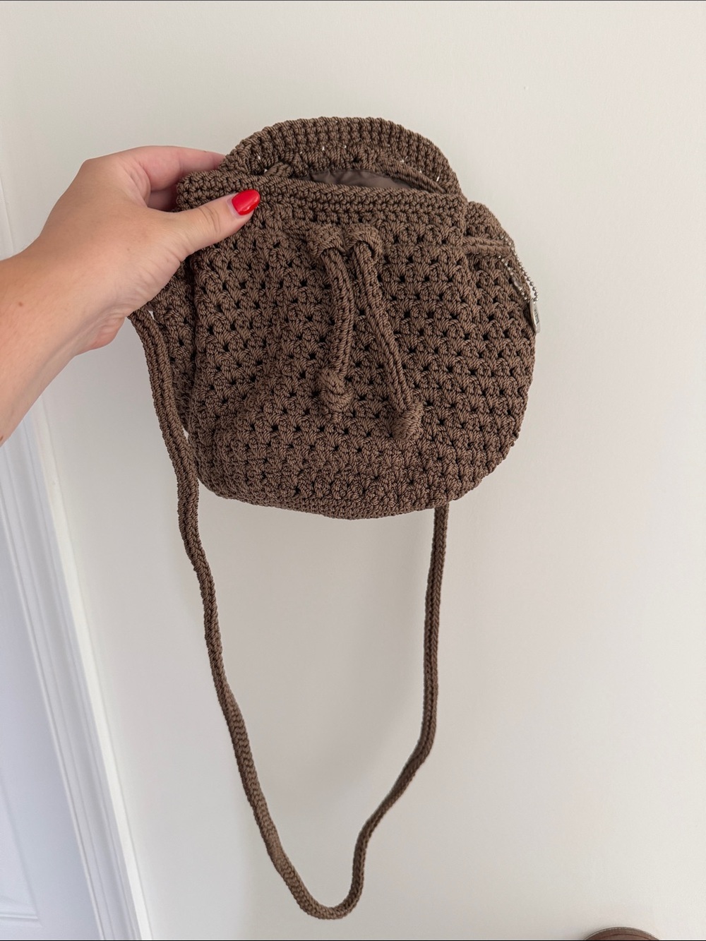The Sak Brown Crochet Drawstring Crossbody Bag